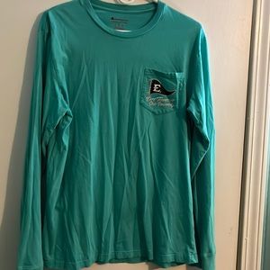 Blue long sleeve Champion shirt.